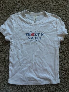 Short N' Sweet Sabrina Carpenter Graphic Baby Tee in White with Blue & Red Print